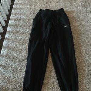 size xs nike sweatpants with thick waistband. fit is bigger